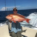 man holding giant fish florida charter